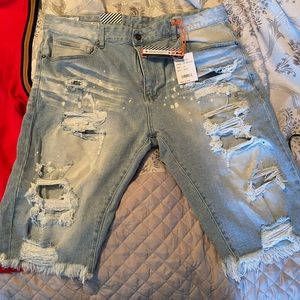 NWT new style light wash distressed shorts